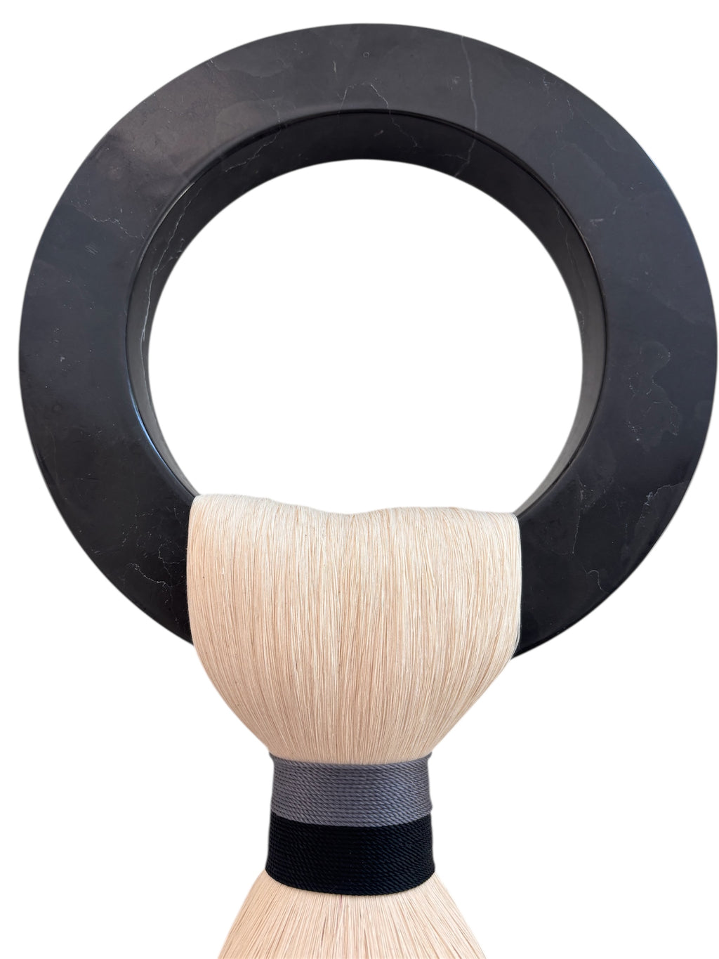 Small black marble hoop with 1 black/grey tassel